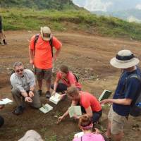 Examining fossils and rocks along the road to Seguin, Haiti